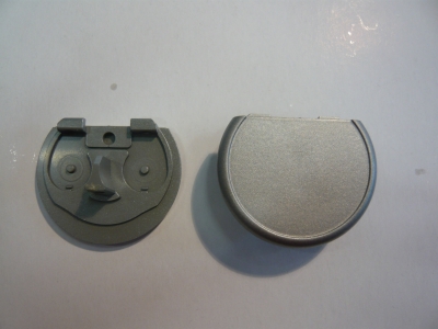 Ein weißer (Abbildung grau) Batteriefachdeckel für das Burg Wächter TSE 4001 System