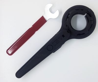 ein Schraubenschlüssel mit roten Griff zum befestigen des Knaufs und ein schwarzer Knaufhalter zum aufdrehen des Knaufs